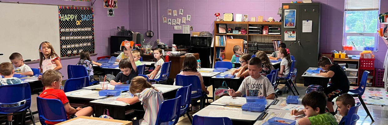 Classroom of students at Flat Lick Elementary engaged in a learning lesson at their desk.